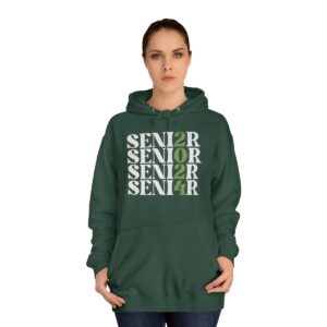 A woman wearing a green hoodie with the word "SENIOR" printed multiple times in different shades of green and white.