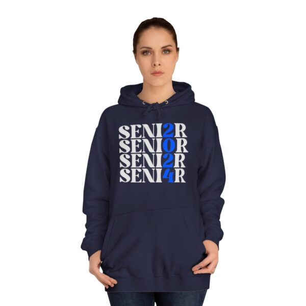 A woman wearing a navy blue hoodie with the word "SENIOR" printed in a repeating pattern, with one instance highlighted in blue.